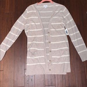 Old Navy badge and white striped sweater